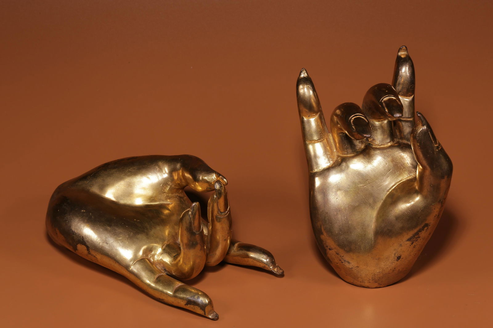 Qing Dynasty, a pair of copper gilt Buddha hands (1 of 9)