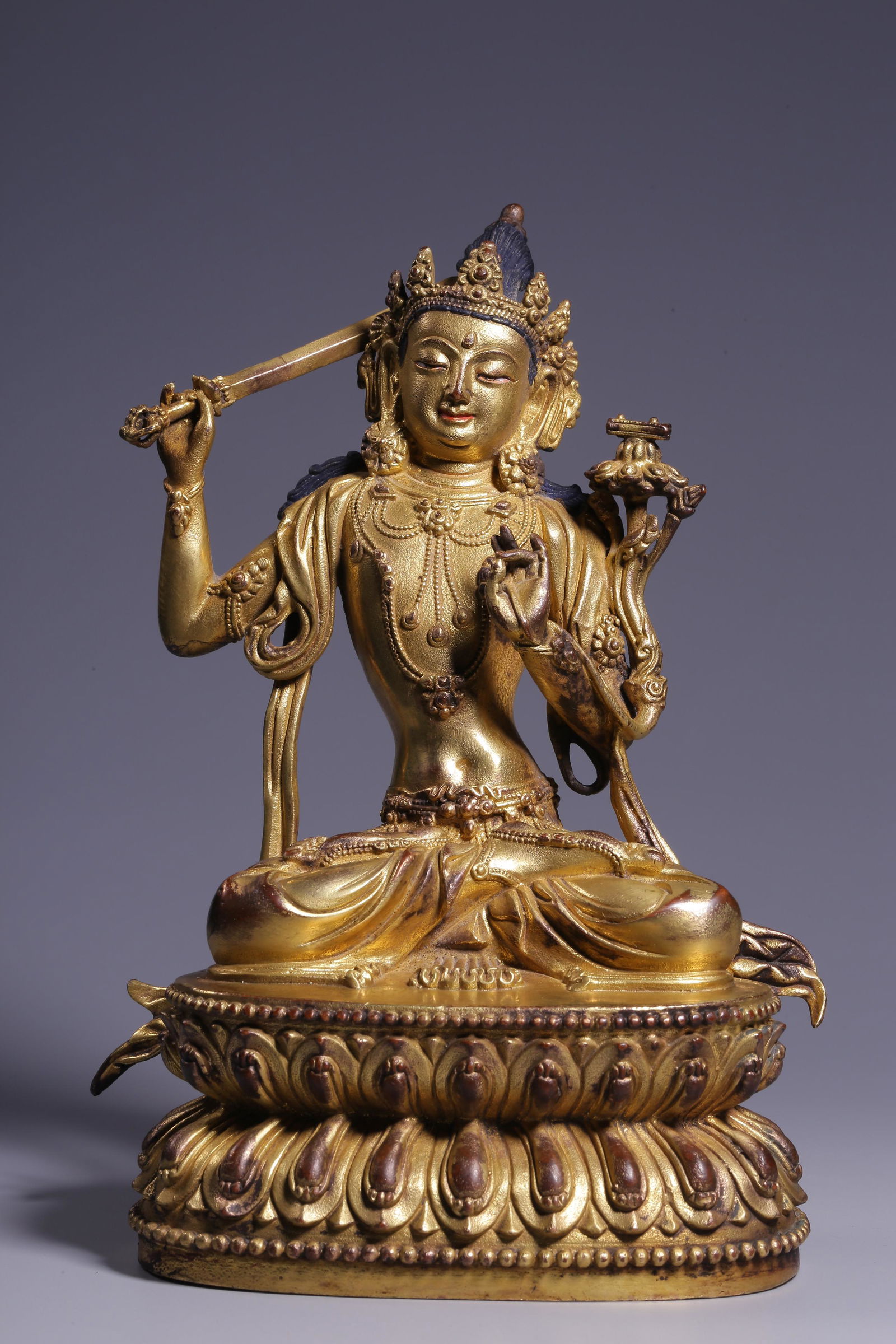 Sitting bronze gilt statue of Manjusri Bodhisattva in Qing Dynasty (1 of 8)