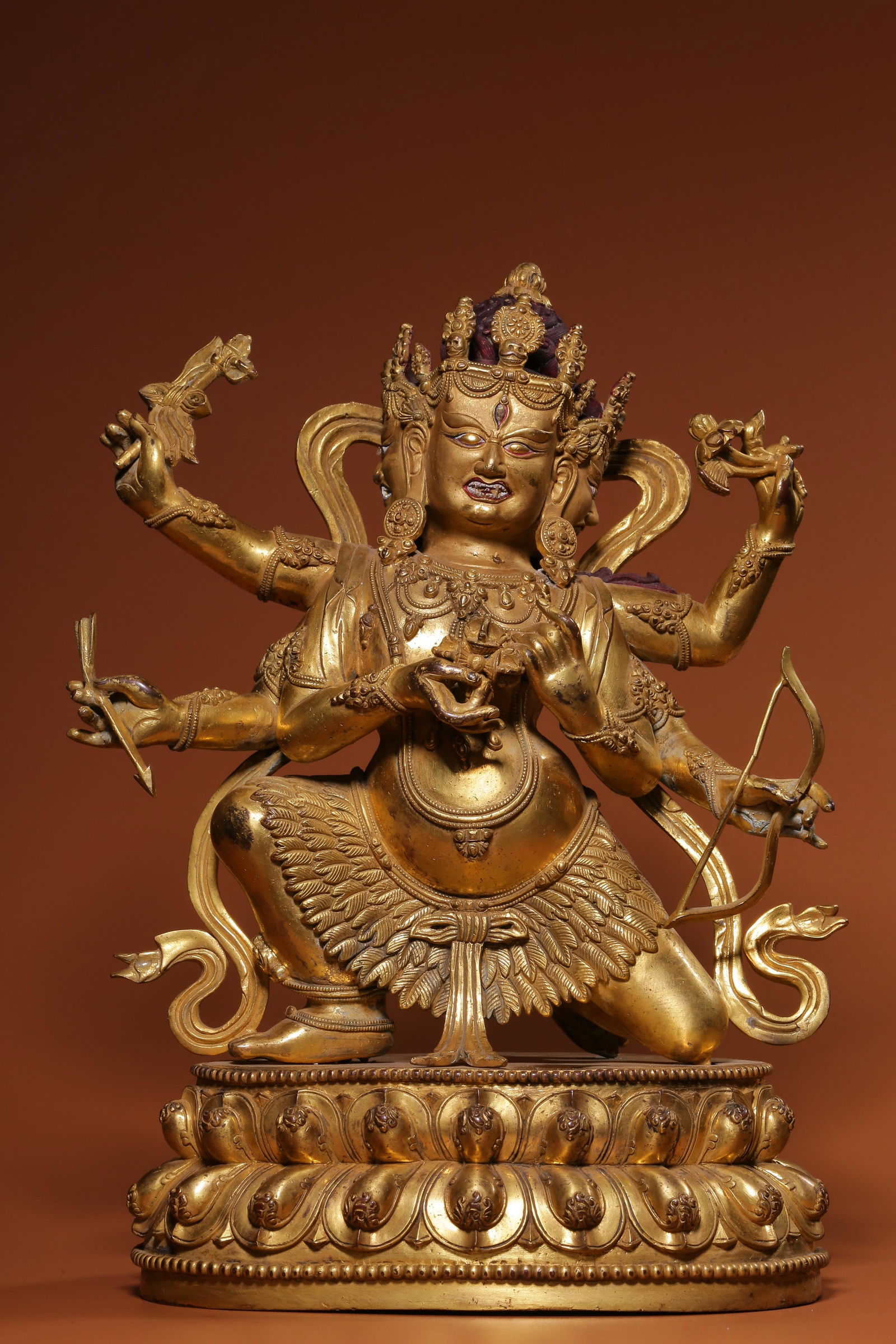 In the Qing Dynasty, a bronze gilt statue of a Buddha mother in leaf clothes (1 of 9)