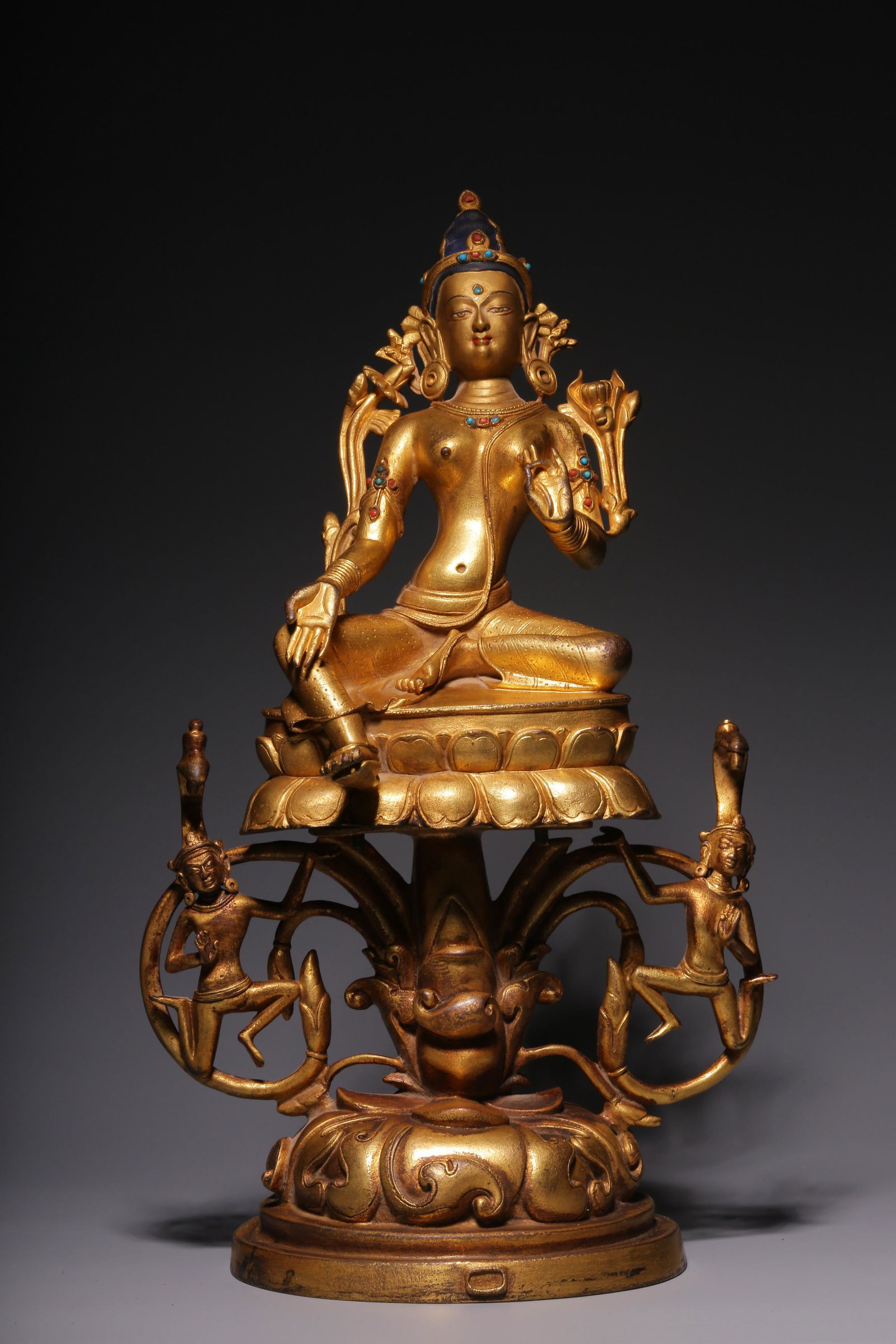 In the Qing Dynasty, a statue of Guanyin inlaid with treasure in gilt copper (1 of 8)