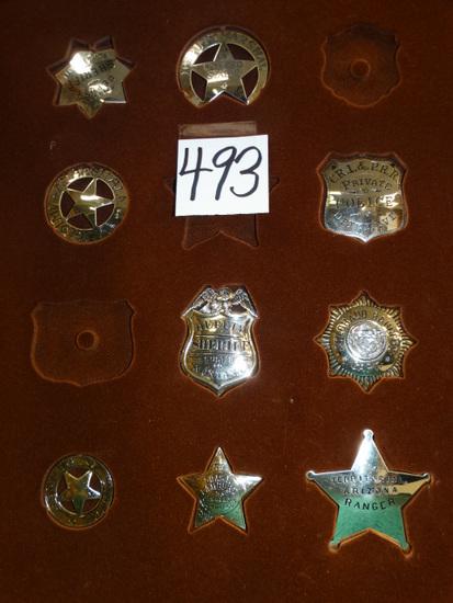 Cool Case of Silver Sheriff Badges: This was a Display Case of 12 Sheriff Badges. Three were sold. You would be bidding on the case with the remaining nine. These are american Silver which is 98.75 pure. Theirs a Game Warden, a Deputy S