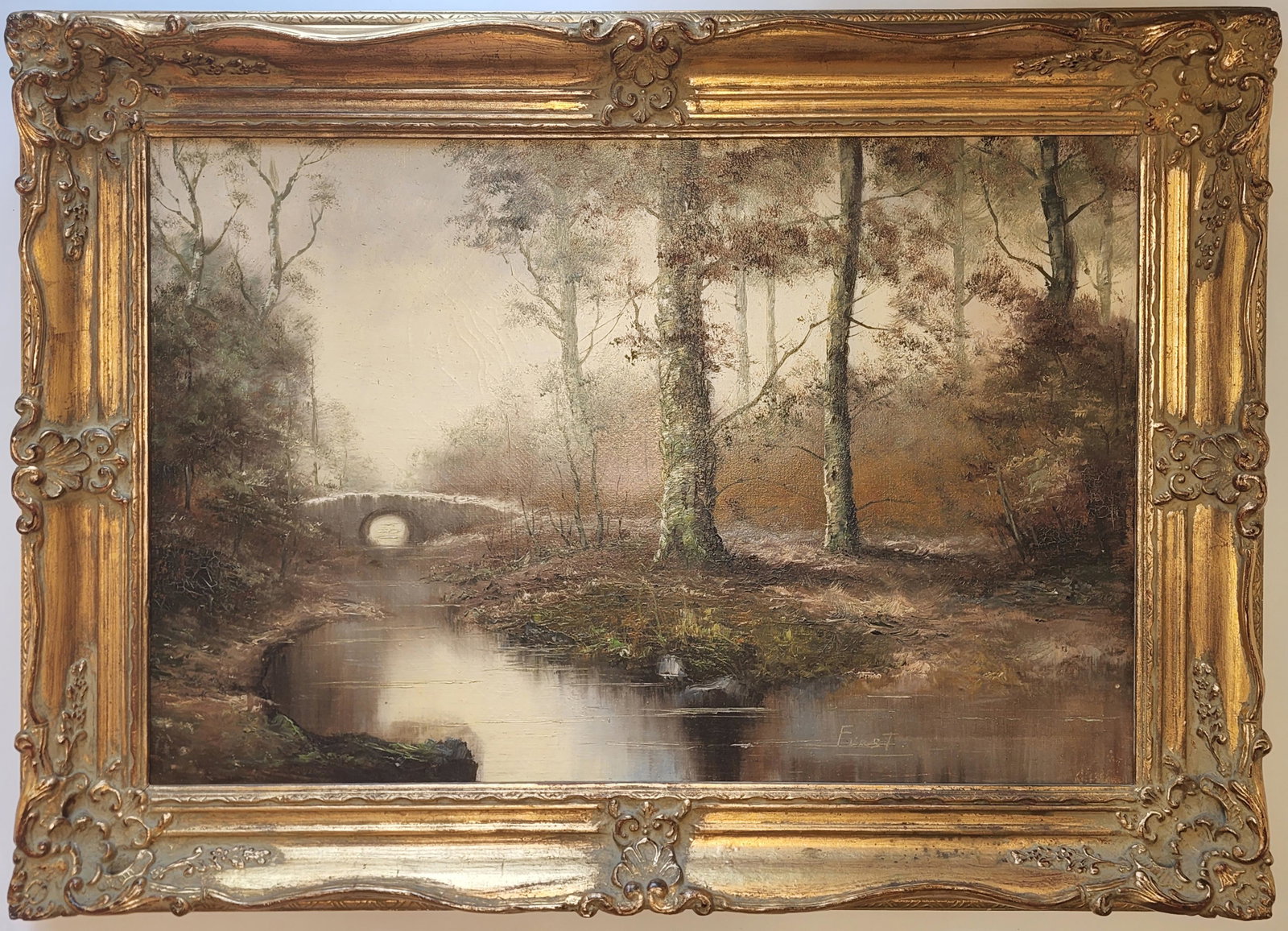 Oil Painting of a Bridge and Creek in Woods: Arthur B. Frost Oil Painting of a Bridge and Creek in Woods Oil painting on canvas, framed Signed by artist, bottom right Framed dimensions: 32 H x 46 W in Dimensions: 24 H x 36 W in All proceeds from