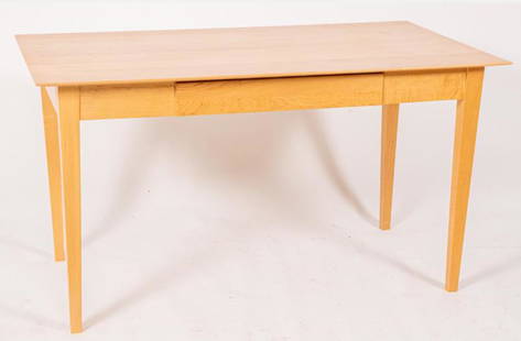 Contemporary Maple Desk with Single Drawer: A Contemporary Maple Desk with Single Drawer, 20th CenturyDimensions: 29.5 H x 30 W x 54 D inAll proceeds from our auctions support the mission of the Dorian Gray Youth Foundation and Dorian Gray