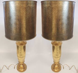 Pair of Hollywood Regency Style, Electrified Metallic Gold Lamps with Shades: Set of two electrified metallic, glass, and wood two-bulb lamps in Hollywood Regency style Dimensions: 39 H x 14 W in (with shade), 5 W in (without shade)Shade: 15 H x 14 W inAll proceeds from our