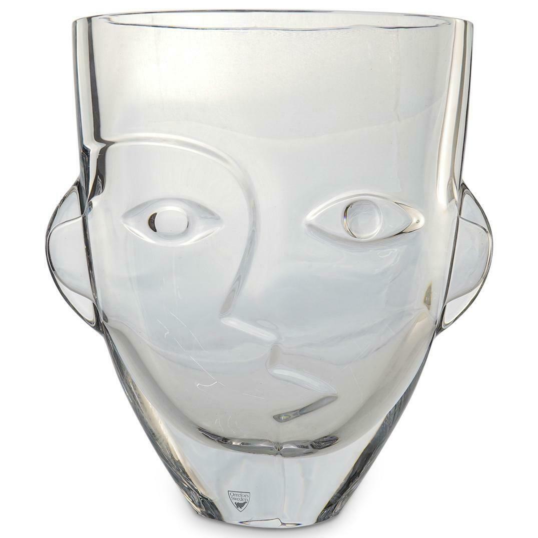 Rare ORREFORS Martti Rytkonen's Ramses Glass Vase: Designed by Martti Rytkonen's (Finland, Born 1960) Oval vase with decoration in relief depicting face with ears is decorated with two faces, one facing forwards, one backwards, one towards the future,