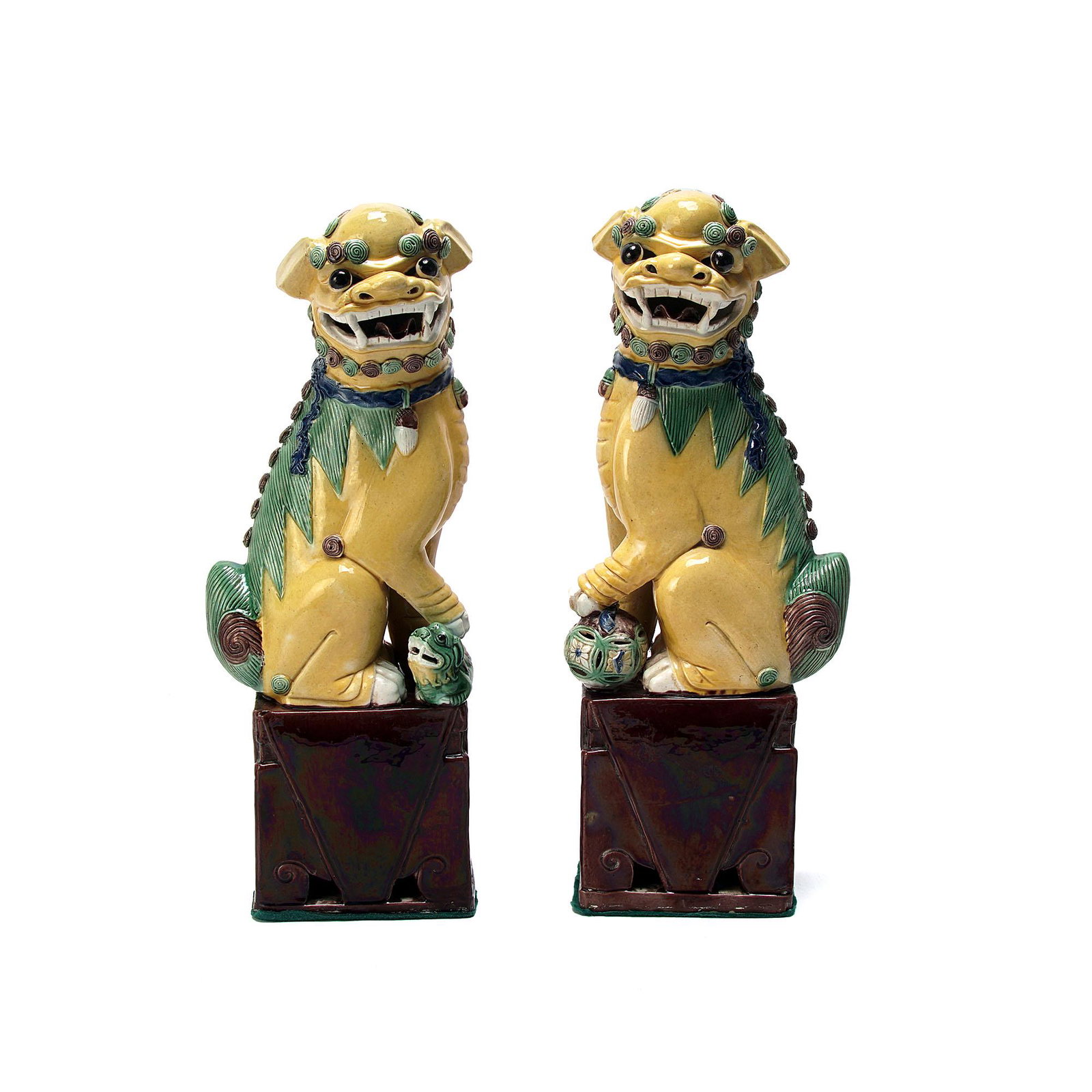 Antique Large Pair of Porcelain Polychrome Foo Dogs 19c: Fine large pair of polychrome glazed "Famille Jaune et Verte" porcelain foo dogs, one female with pup the other male with front paw resting on pierced ball, decorated in overglaze enamels in brilliant