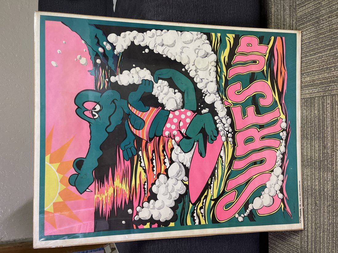 1976 surfs up alligator surfing blacklight poster: Very cool Alligator surfing â€œSurfs up” black light poster made by poster originals out of Hollywood CA. Measures 23” x 29”. Slight corner dings
