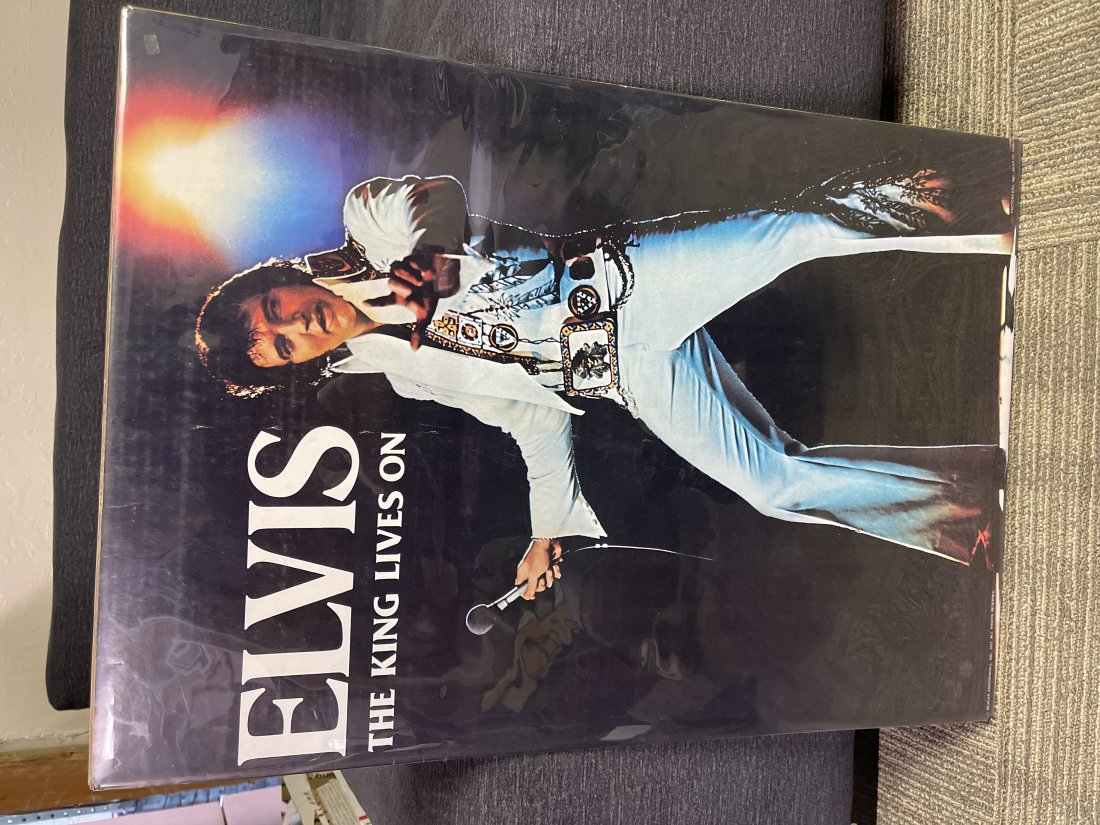 Elvis the king lives on poster 1977: 1977 poster by Boxcar enterprises. Elvis Presley â€œThe King Lives on” poster. Measures 20” x 28”. Great iconic image! Slight corner dings