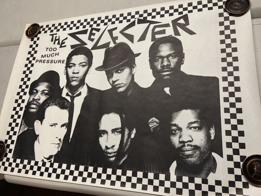 The selected â€œToo Much Pressure” promo poster: Good condition. Checkered border version. Measures 38” x 27”. Slight edge wear