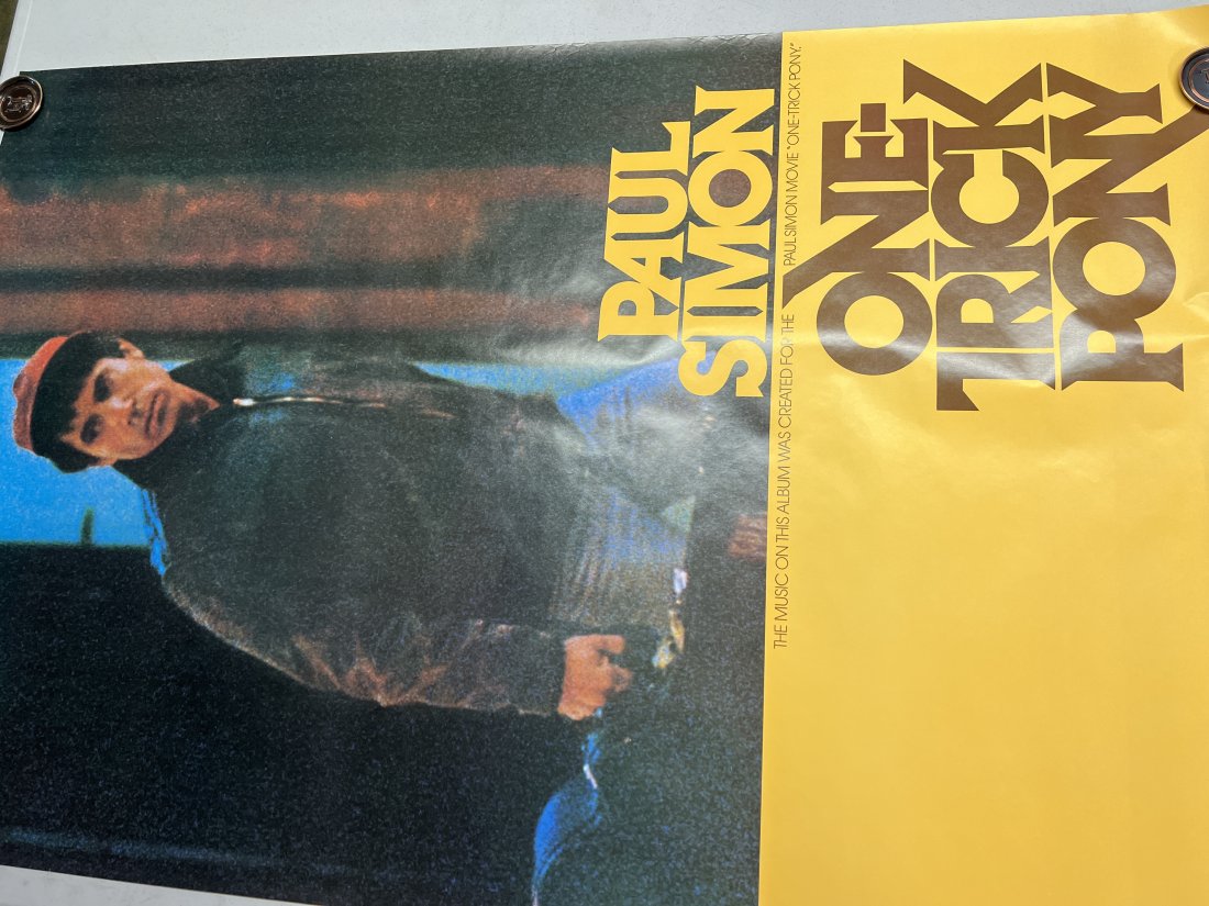 Paul Simon Movie One Trick Pony 1980 Promo Poster: Poster may show minimal damages such as cornerwear, edgewear as shown in photos. Posters may also show crease marks due to prior forms of storage. Measurements: 58.5” x 39.5”