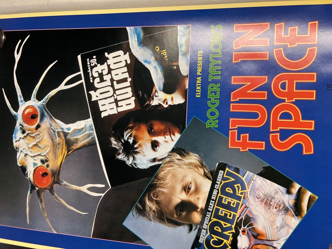 Roger Taylorâ€™s Fun In Space Elektra Promo Poster: Poster may show minimal damages such as cornerwear, edgewear as shown in photos. Posters may also show crease marks due to prior forms of storage. Measurements: 36” x 24”