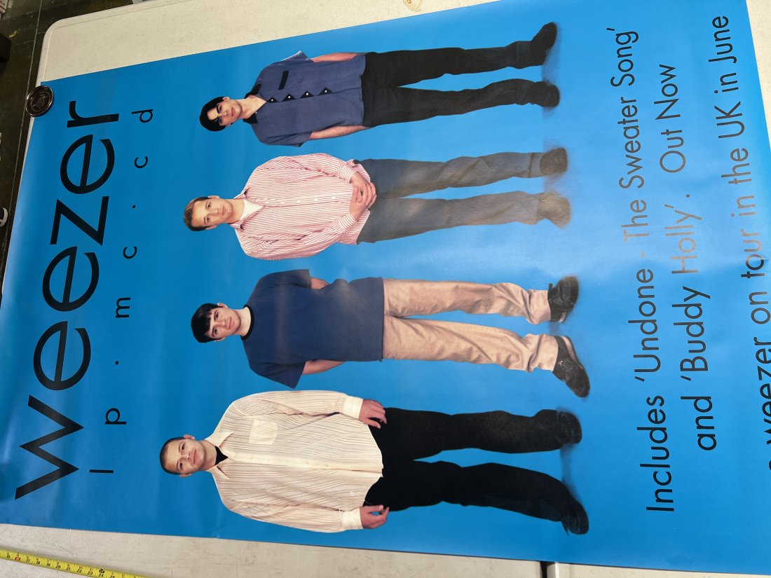 Weezer LP MC CD See Weezer On Tour in UK Promo Poster: Poster may show minimal damages such as cornerwear, edgewear as shown in photos. Posters may also show crease marks due to prior forms of storage. Measurements: 60” x 40”