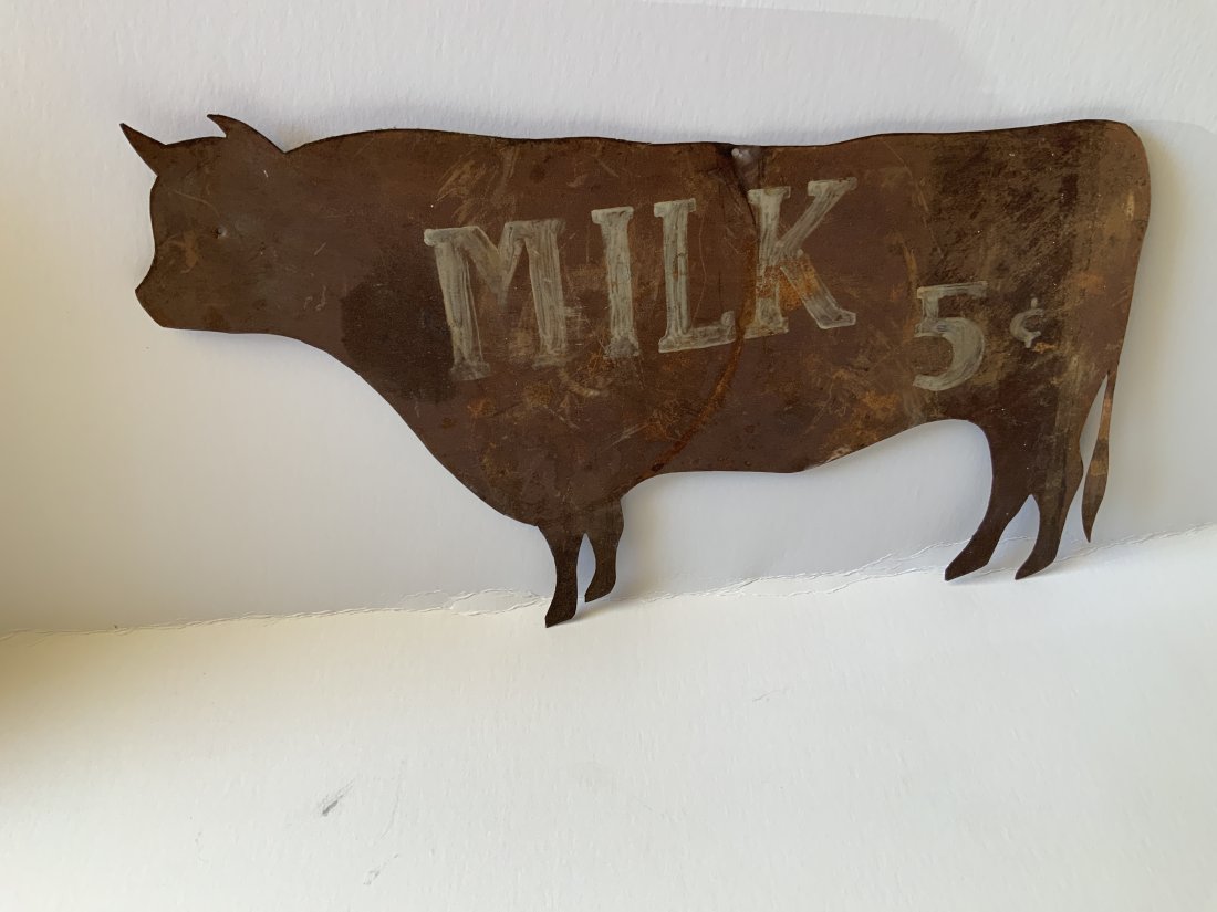 Old tin milk sign die cut in shape of bull (1 of 7)