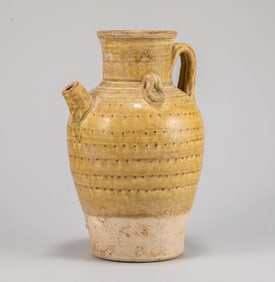 Tang Dynasty Yellow Glazed Holding Pot