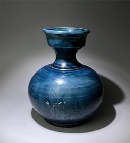 Tang Dynasty Blue Glazed Pan Mouth Bottle