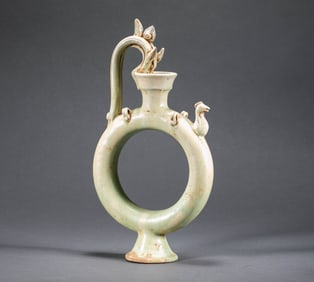 Han Dynasty light blue glazed chicken head pot