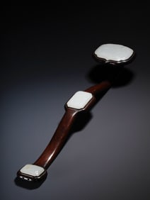 Qing Dynasty rosewood inlaid with white jade Ruyi