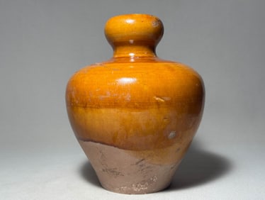 Tang Dynasty yellow glazed gourd bottle