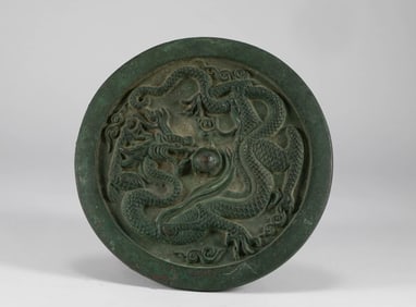 Ming Dynasty bronze dragon patterned mirror