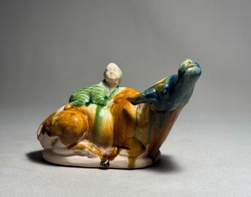 Tang Dynasty Three Colored Shepherd Riding Cattle