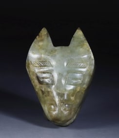 mask of an animal head worn by an actor