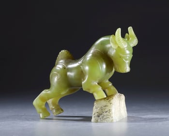 Han Dynasty round carved jade dragon