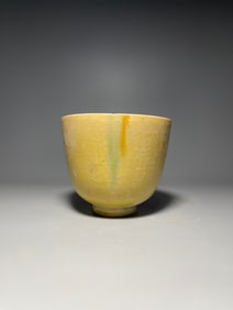 Yellow glazed tea cup from Xiangzhou Kiln of Northern Qi Dynasty