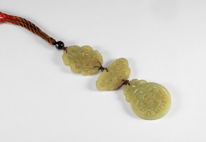 A set of Qing Dynasty yellow jade ornaments