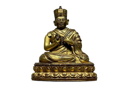 Copper gilded Buddha statue