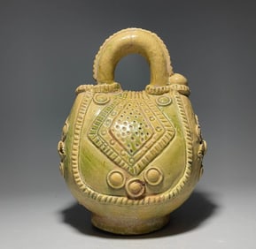 Sui Dynasty Xiangzhou Kiln Yellow Glazed Leather Bag Pot