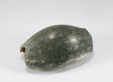 Jade turtle embedded with gold wire