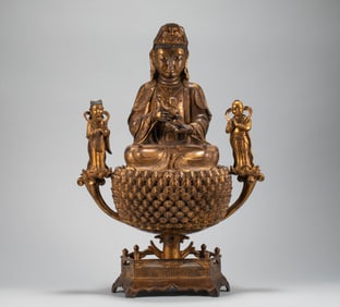 Bronze gilded statue of Guanyin giving birth in the Ming Dynasty