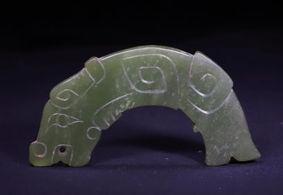 Dragon patterned fish tail pendant