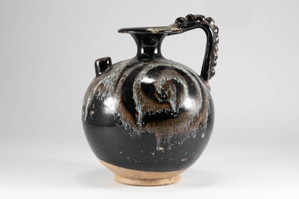 Tang Dynasty flower glazed dragon handle holding pot