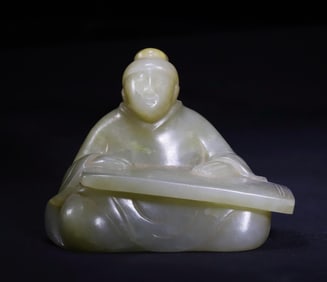 Jade man playing the qin