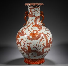 In the Qing Dynasty, a pink dragon patterned double ear sky ball bottle
