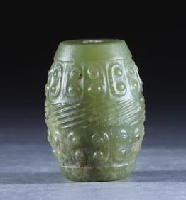 Drum shaped jade pendant