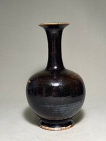 Tang Dynasty black glazed long necked vase