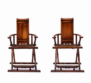 In the Qing Dynasty, a pair of yellow pear wood chairs
