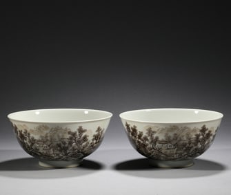 In the Qing Dynasty, a pair of ink colored landscape patterned bowls