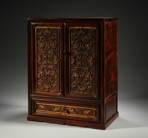 In the Qing Dynasty, a storage cabinet made of Huanghua pear wood embedded with boxwood