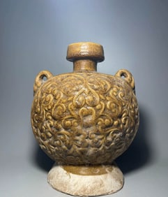 Tang Dynasty yellow glazed flat teapot