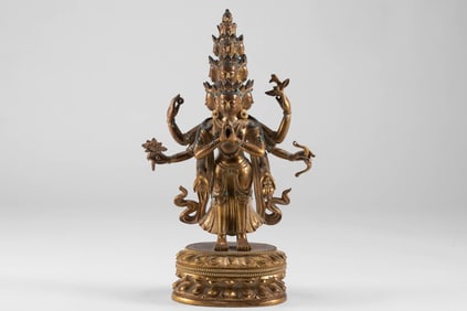 Qing Dynasty copper gilded 12 sided six armed Guanyin statue