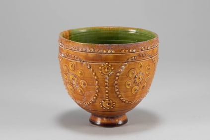 Tang Dynasty yellow glazed milk nail patterned bowl