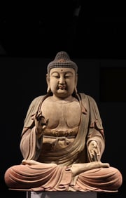Wooden statue of Buddha sitting