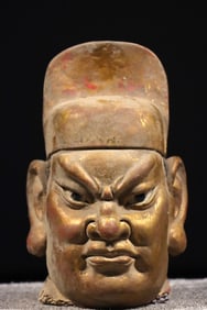 Clay sculpture with gold inscriptions official