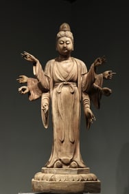 Nanmu wood carving eight armed Guanyin statue