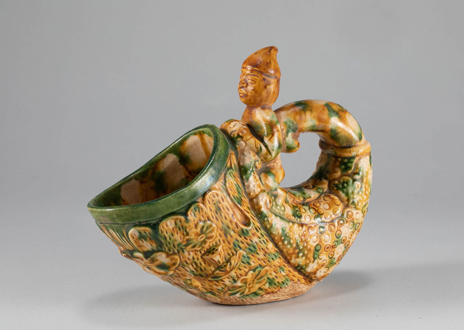 Tang Dynasty Tri colored Corner Cup: H:13.2cm L:16cm