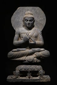 Gray slate Gandhara seated statue