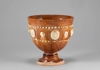 Tang Dynasty yellow glazed high footed bowl